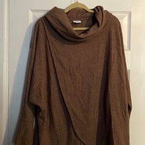 Large Kristen neutral beige color. Cowl neck  68% poly 29% rayon 3% spandex.